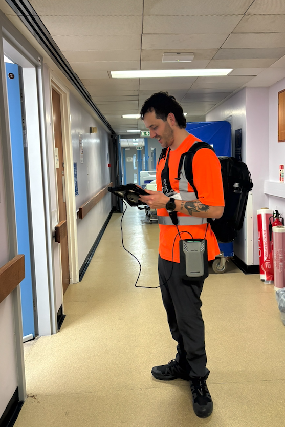 Professional WiFi survey being conducted in NHS hospital ward by Sprintwave engineer